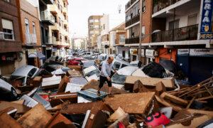 Day in Photos: Severe Flash Floods, Murder Trials, and Honoring Victims of Communism